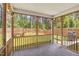 Enjoy the view of the beautiful backyard from this relaxing screened in porch at 126 Elmsford St, Durham, NC 27703