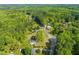 An aerial view of the houses and surrounding green trees in this beautiful and scenic community at 12601 Boyce Mill Rd, Raleigh, NC 27613
