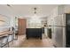Charming kitchen featuring an island, stainless steel appliances, and lots of natural light at 12601 Boyce Mill Rd, Raleigh, NC 27613