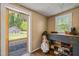 Mud room with outdoor view, storage and a golf bag at 12601 Boyce Mill Rd, Raleigh, NC 27613