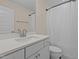 Bathroom with a single sink vanity, toilet and shower and tub combination at 1265 Meadow Queen Ln, Apex, NC 27502