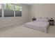 Bedroom with neutral color scheme, natural light, and minimalist decor at 1265 Meadow Queen Ln, Apex, NC 27502