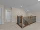 Open bonus room with stairway, bathroom, and ample space for activities at 1265 Meadow Queen Ln, Apex, NC 27502