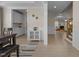 Spacious dining room with hardwood floors leading to living room and kitchen at 1265 Meadow Queen Ln, Apex, NC 27502