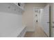 Mudroom featuring a bench and shelving space and entry to the rest of the home at 1265 Meadow Queen Ln, Apex, NC 27502