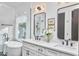 Modern bathroom featuring double vanities, a soaking tub, and sleek fixtures creating a luxurious retreat at 1336 Courtland Dr, Raleigh, NC 27604