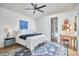 Bright bedroom featuring a stylish bed, modern decor, and an ensuite bathroom for added convenience at 1336 Courtland Dr, Raleigh, NC 27604