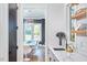 Bright kitchen featuring white countertops, a modern sink, and an open view to the dining area at 1336 Courtland Dr, Raleigh, NC 27604