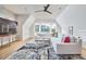 Spacious living room with high ceilings, neutral decor, large windows, and comfortable seating at 1336 Courtland Dr, Raleigh, NC 27604
