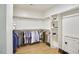 Spacious walk-in closet featuring ample shelving and hanging space for clothes and storage at 1336 Courtland Dr, Raleigh, NC 27604