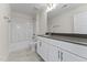 Bathroom featuring a bath/shower combination and a single sink vanity with granite countertop at 134 Ivy Ridge Rd, Chapel Hill, NC 27516