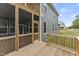 Exterior view of a wooden deck attached to the house with a screened porch, great for outdoor living at 134 Ivy Ridge Rd, Chapel Hill, NC 27516