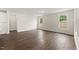 Inviting living room with hardwood floors, neutral walls, and ample natural light at 134 Ivy Ridge Rd, Chapel Hill, NC 27516