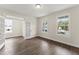 Bright office space with wood floors, natural light, and glass paneled doors at 134 Ivy Ridge Rd, Chapel Hill, NC 27516