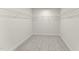 Empty walk-in closet with neutral carpet and wire shelving at 134 Ivy Ridge Rd, Chapel Hill, NC 27516