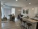 Inviting living space with an open layout, hardwood floors, and recessed lighting at 143 Rolesville Ridge Dr, Rolesville, NC 27571