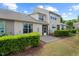 Backyard of the home featuring lush green landscaping, well-maintained bushes, and privacy at 15 Plumas Drive Dr, Durham, NC 27705