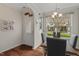 Bright dining area with hardwood floors and a large window with neighborhood view at 15 Plumas Drive Dr, Durham, NC 27705