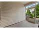 Screened-in patio, providing a comfortable outdoor space with a view of the backyard at 15 Plumas Drive Dr, Durham, NC 27705