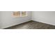 Cozy room with new floors and a large window offering plenty of natural light at 152 Global Ave, Fuquay Varina, NC 27526