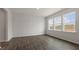 Bright living room features hardwood floors, recessed lighting, and multiple windows at 152 Global Ave, Fuquay Varina, NC 27526