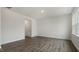 Bright living room features hardwood floors, recessed lighting, and an open doorway at 152 Global Ave, Fuquay Varina, NC 27526