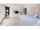 A serene bedroom showcases carpeted floors and an attached bathroom at 16106 Morehead, Chapel Hill, NC 27517