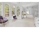 The bedroom offers an elegant space with large windows and access to an attached bedroom at 16106 Morehead, Chapel Hill, NC 27517