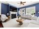 Stylish living room featuring a fireplace, modern furnishings, and natural light at 16106 Morehead, Chapel Hill, NC 27517