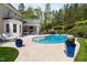 Inviting pool and patio area with outdoor seating and a picturesque view of the home at 16106 Morehead, Chapel Hill, NC 27517
