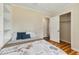 This comfortable bedroom offers hardwood floors, bright lighting, and closet space at 1624 Cone Ave, Apex, NC 27502