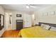 The spacious bedroom has a full closet and a stylish ceiling fan at 1624 Cone Ave, Apex, NC 27502