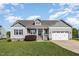 Charming single-Gathering home with two-car garage, manicured lawn, and lovely landscaping at 173 Silver Tee Ct, Selma, NC 27576