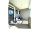 Inviting front porch with comfortable seating, ideal for relaxation at 173 Silver Tee Ct, Selma, NC 27576