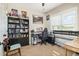 Bright office with a large window, desk, and ample storage shelving at 173 Silver Tee Ct, Selma, NC 27576