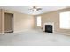 Spacious living room with a fireplace at 2 White Spruce Ct, Durham, NC 27703