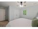 Comfortable carpeted bedroom with a ceiling fan, window, and closet for storage at 2004 Valley Ridge Ct, Raleigh, NC 27603