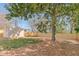 A spacious fenced-in backyard with a storage shed at 2014 Walnut St, Durham, NC 27705