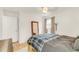 Bedroom featuring a wooden platform bed, hardwood floors, and lots of natural light at 2014 Walnut St, Durham, NC 27705