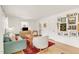 Bright and inviting living room with stylish furnishings, hardwood floors, and eclectic decor at 2014 Walnut St, Durham, NC 27705