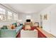 Cozy living room with ample natural light, comfortable seating, and stylish decor elements at 2014 Walnut St, Durham, NC 27705