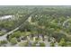 Aerial shot showcases a community surrounded by lush green trees at 207 Ashley Brook Ct, Cary, NC 27513