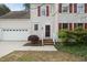 Close up of entry to this delightful residence with a two car garage at 207 Ashley Brook Ct, Cary, NC 27513
