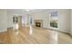 Bright and open living room features a fireplace and hardwood floors at 207 Ashley Brook Ct, Cary, NC 27513