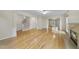 Spacious living room with fireplace, hardwood floors and staircase at 207 Ashley Brook Ct, Cary, NC 27513