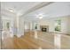 Spacious living room with hardwood floors and a cozy fireplace at 207 Ashley Brook Ct, Cary, NC 27513