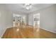 Spacious living room featuring hardwood floors and an open layout connecting to other areas of the home at 207 Ashley Brook Ct, Cary, NC 27513