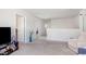 Upstairs bonus room with neutral walls, carpet, and natural light at 217 Braeburn Dr, Graham, NC 27253
