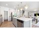 Spacious kitchen features a large island, stainless steel appliances, and connects seamlessly to living areas at 217 Braeburn Dr, Graham, NC 27253