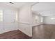 Bright and spacious foyer features hardwood floors and a view into the living room and dining area at 2225 Whitley Dr, Durham, NC 27707